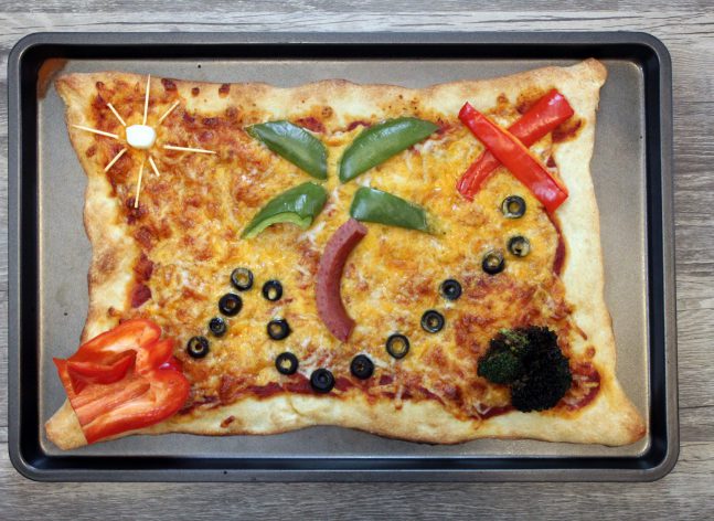 A pizza decorated to look like a treasure map