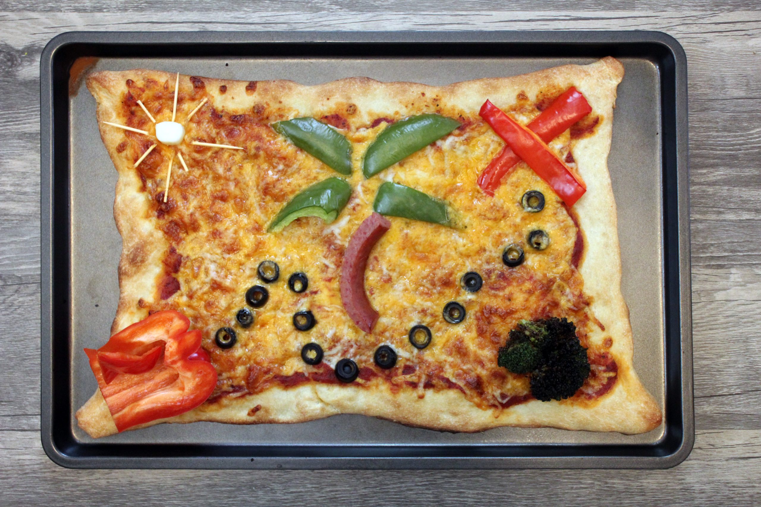 A pizza decorated to look like a treasure map