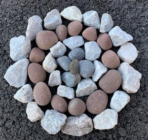 Nature Mandala made out of different color rocks