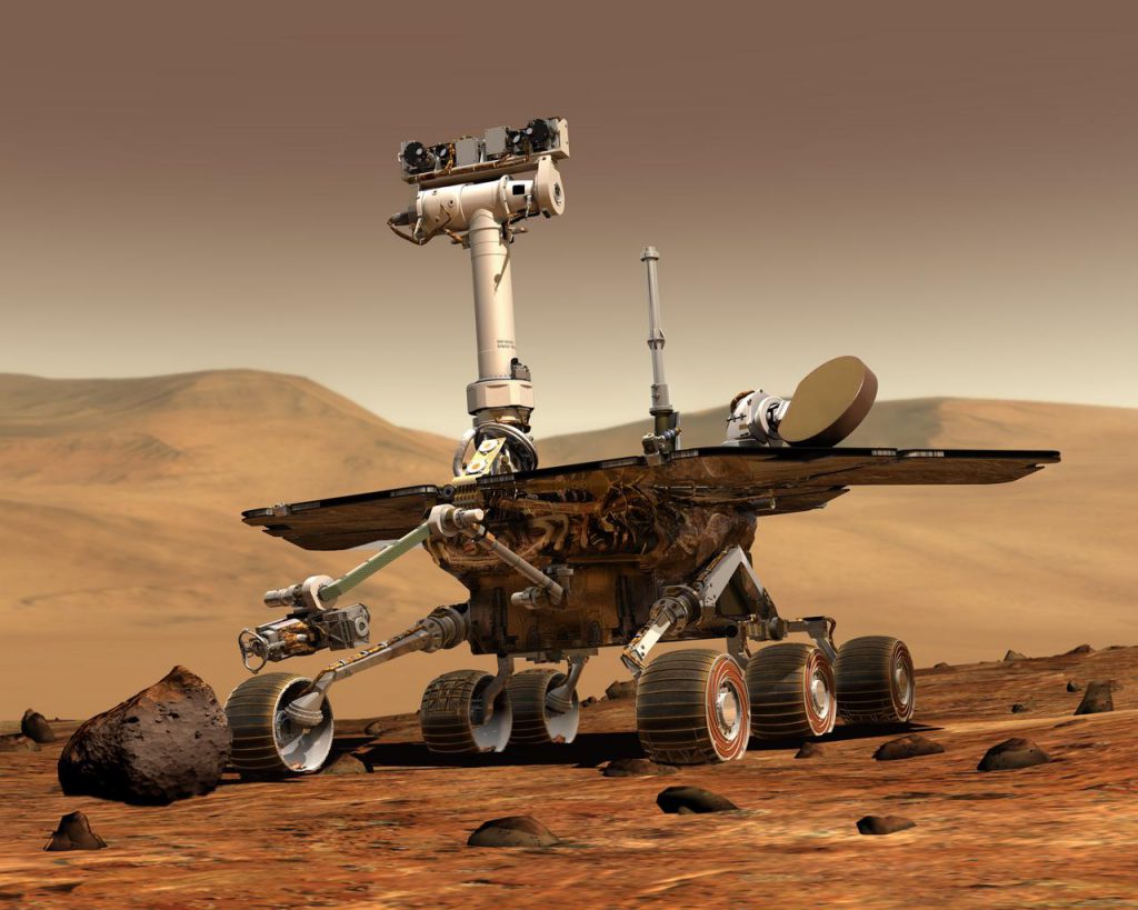 An artist concept portrays a NASA Mars Exploration Rover on the surface of Mars.