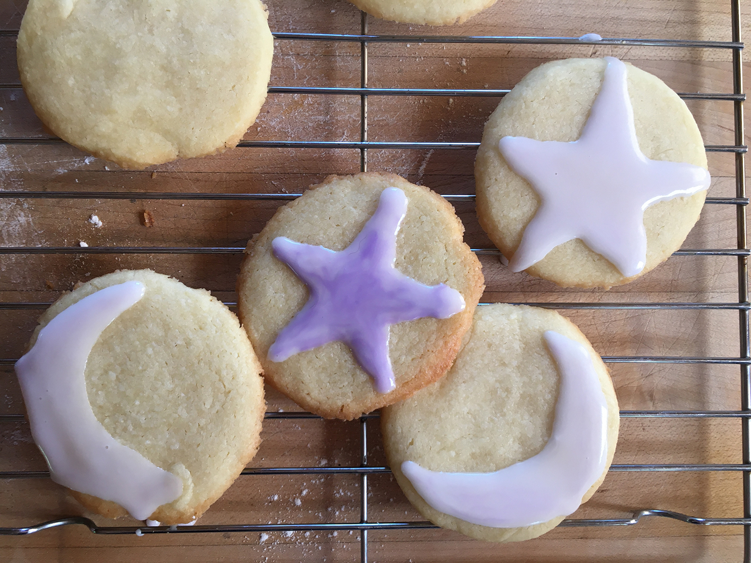 cookies decorated like stars and moons